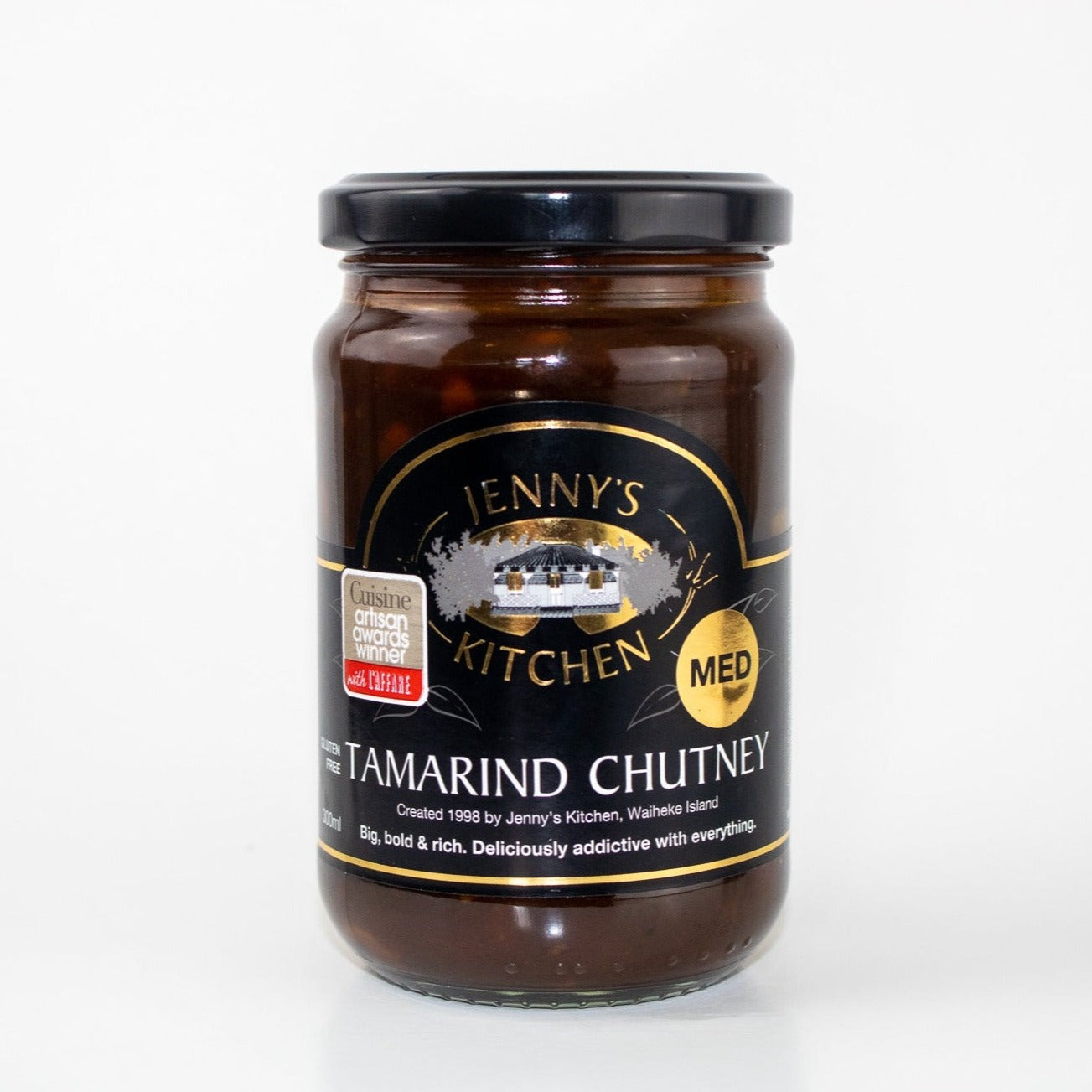 image of a clear jar with a black label and black lid. the jar has tamarind chutney written in white on the label 