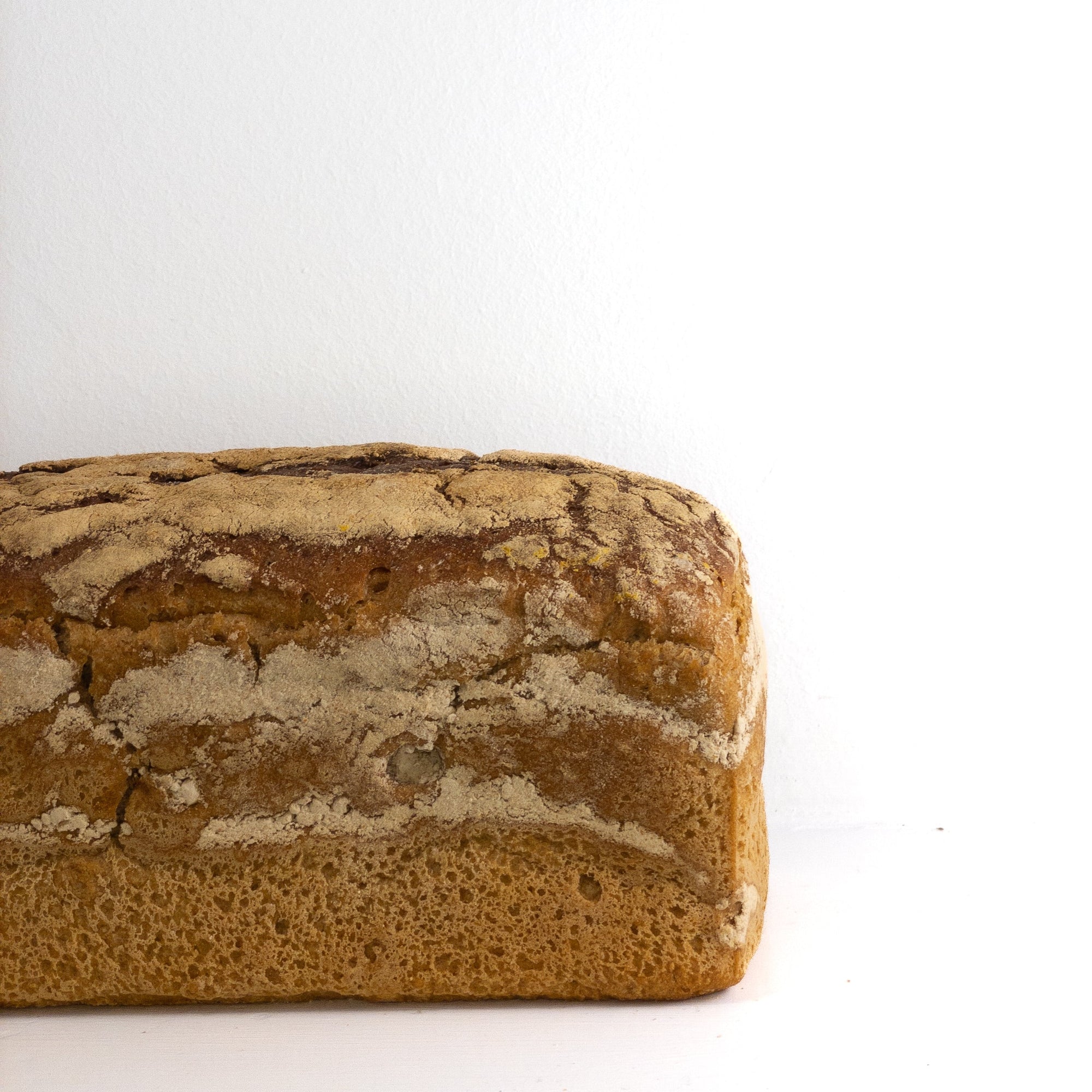 close up image of the brown rye loaf