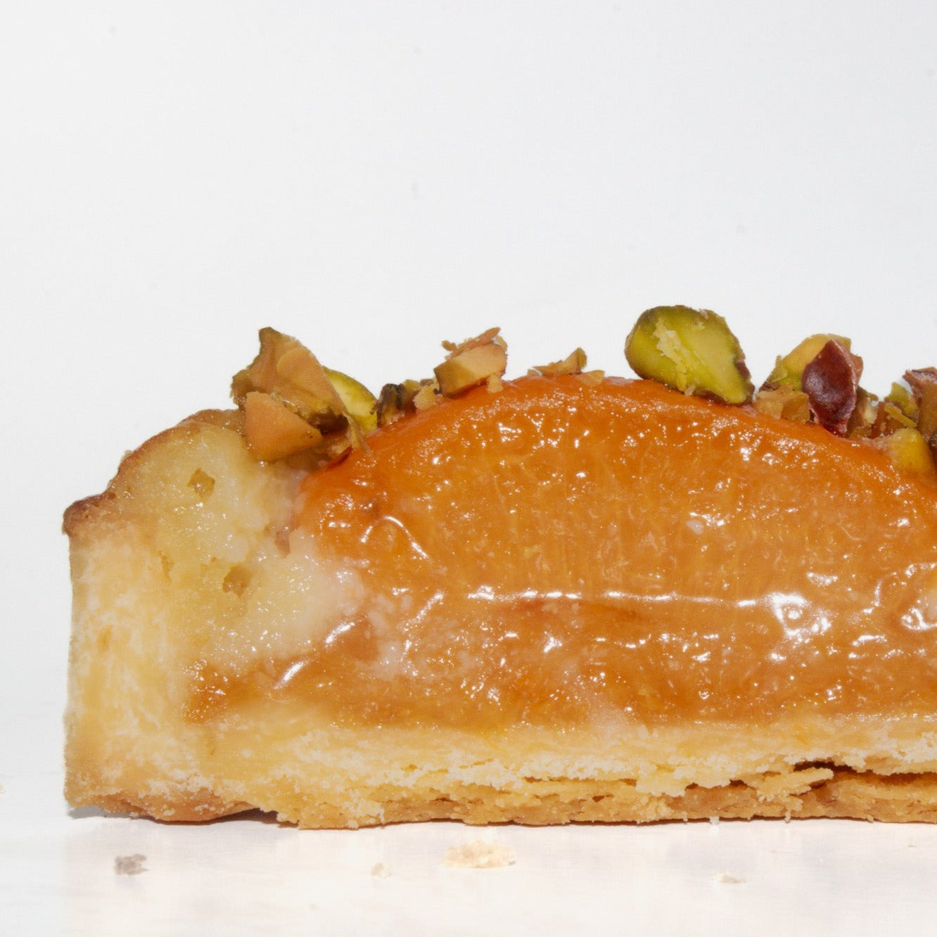 Side profile image of the inside of the apricot tart 