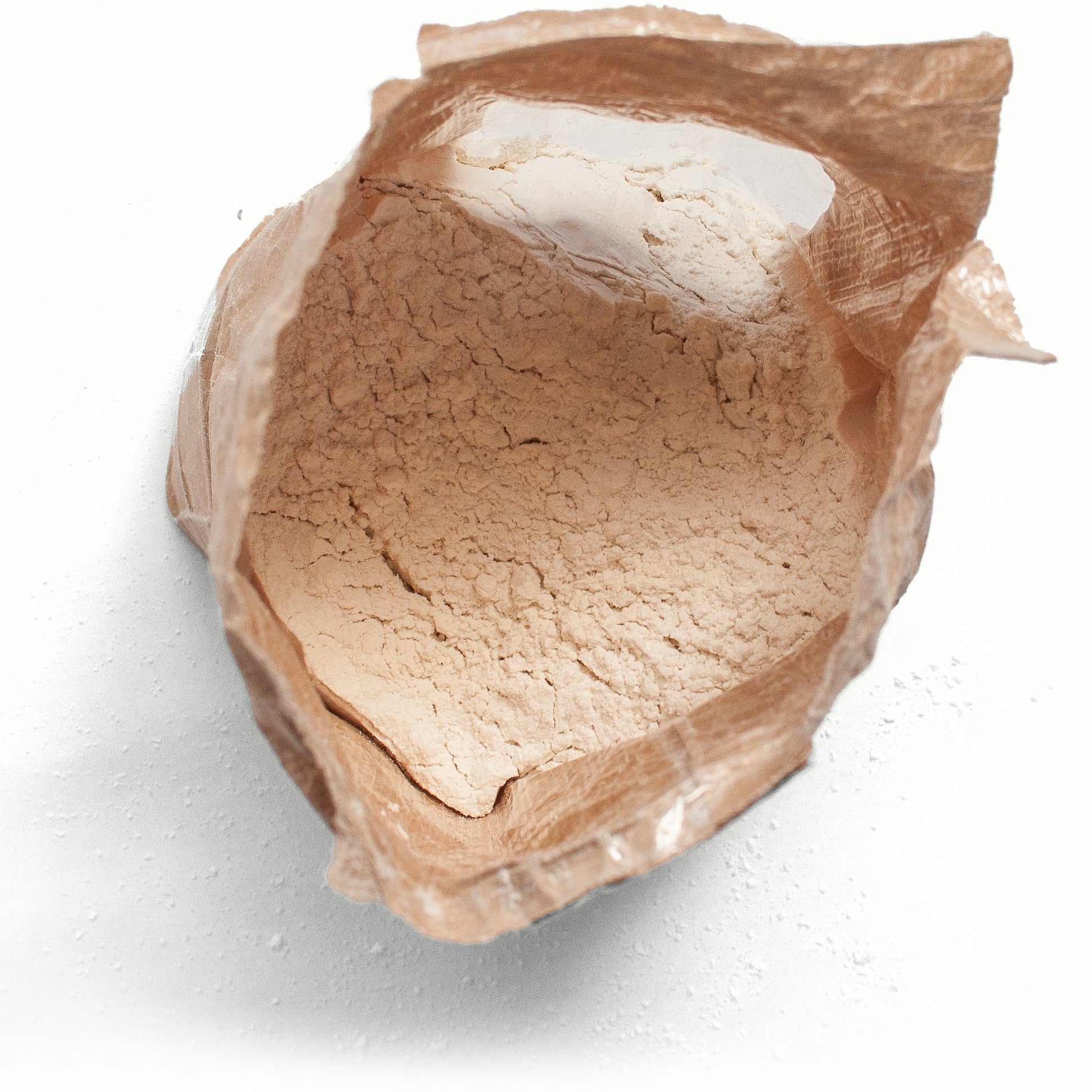 image of the inside of the bag of flour. the flour is a creamy white powder